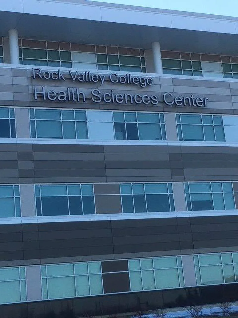 Rock Valley College Health Sciences Center dimensional building ID mounted high on a multi-story modern facade.