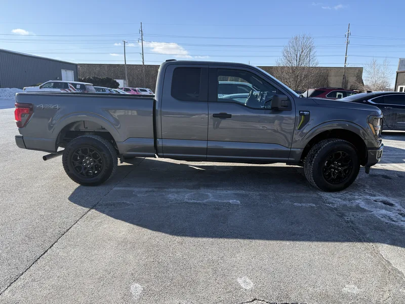 BEFORE: stock gray Ford F-150 delivered to CorPro for the Sheriff's Community Outreach wrap.